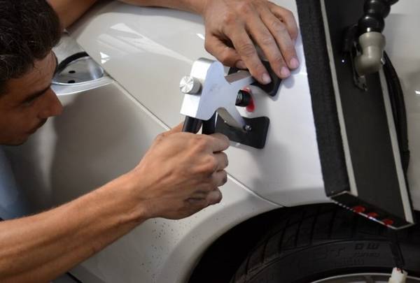 Фокусы кузовного ремонта: как выправить вмятину на авто, не прибегая к покраске? с фото
